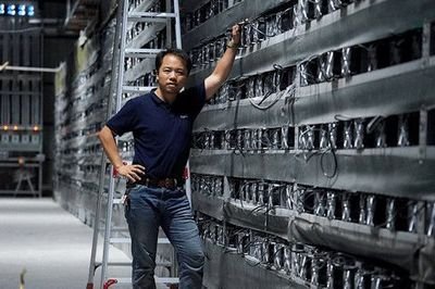 An expansive mining farm with rows of mining rigs