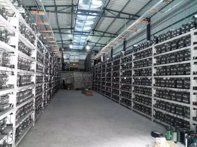 A bustling African mining farm powered by solar energy, hosting various cryptocurrency miners and rigs